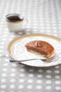 Mini Pecan Pie with Caramel Topping on a plate with a cup of coffee Royalty Free Stock Photo