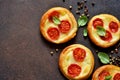Mini pie with tomatoes and cheese. Quiche with vegetables