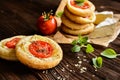 Mini pizzas with Camembert and tomato Royalty Free Stock Photo