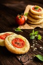 Mini pizzas with Camembert and tomato Royalty Free Stock Photo