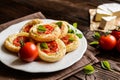 Mini pizzas with Camembert and tomato Royalty Free Stock Photo