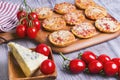 Mini pizzas on a wooden table Royalty Free Stock Photo