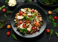 Mini potato gnocchi tricolour with tomato, spinach, Seasonal salad leaves and parmesan cheese