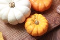 mini pumpkin close-up on a wooden table Royalty Free Stock Photo