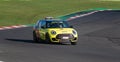 Mini racing car monobrand trophy safety car on racetrack motor sport scene