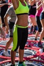 Mini Rebounder Workout: Girls doing Fitness Exercise in Outdoor Class at Gym