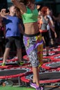 Mini Rebounder Workout: Girls doing Fitness Exercise in Outdoor Class at Gym