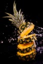 Fresh pineapple in splash water Royalty Free Stock Photo