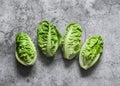 Mini roman salad on a grey background, top view. Food preparation ingredient.Copy space