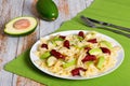 Mini salami farfalle Pasta warm salad with avocado slices Royalty Free Stock Photo