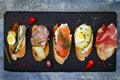 Mini sandwiches food set. Brushetta or authentic traditional spanish tapas for lunch table. Delicious snack, appetizer, antipasti Royalty Free Stock Photo