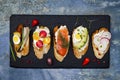 Mini sandwiches food set. Brushetta or authentic traditional spanish tapas for lunch table. Delicious snack, appetizer, antipasti Royalty Free Stock Photo