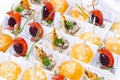 Mini snacks for buffet and banquet in a plastic bowl