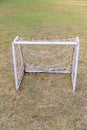 Mini Soccer goal on the green grass field. Outdoors mini football court. Mini football goal Royalty Free Stock Photo