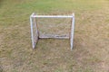 Mini Soccer goal on the green grass field. Outdoors mini football court. Mini football goal Royalty Free Stock Photo