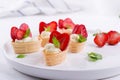 Mini tartlets on the plate . Homemade dessert with delicious cream cheese Royalty Free Stock Photo