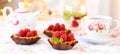 Mini tarts with raspberries fruits Royalty Free Stock Photo