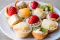 Mini Tarts, Tartolet or Tartlets with cream and fresh fruit Royalty Free Stock Photo