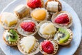 Mini Tarts, Tartolet or Tartlets with cream and fresh fruit Royalty Free Stock Photo