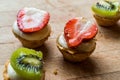 Mini Tarts, Tartolet or Tartlets with Strawberry, Cream and fresh fruits. Royalty Free Stock Photo