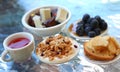 Mini tea party with blueberries and chocolate and more.