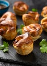 Mini Toad in the hole, Baked sausages in Yorkshire pudding with gravy Royalty Free Stock Photo