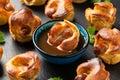 Mini Toad in the hole, Baked sausages in Yorkshire pudding with gravy Royalty Free Stock Photo