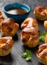 Mini Toad in the hole, Baked sausages in Yorkshire pudding with gravy Royalty Free Stock Photo