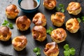 Mini Toad in the hole, Baked sausages in Yorkshire pudding with gravy Royalty Free Stock Photo