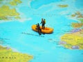 Mini toy with blurred map as a background. Traveling concept design.