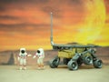 Mini toy at table with blurred background. Astronaut concept design. Royalty Free Stock Photo