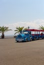 Mini train is transporting tourists in the sea garden of Burgas