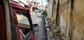 Songkla, Thailand - Jan.27 ,2018 : Mini truck taxi drove through narrow alley in old town