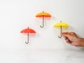 Mini umbrella decor with man hand holding color red, orange and