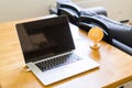 Mini usb fan near laptop. Summer office day. Mini portable cooler Royalty Free Stock Photo
