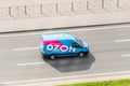 Mini van truck for delivery to points of delivery of the online store Ozon.ru rushing rides highway city road. Russia, Saint-