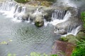 Mini waterfall in the city park. Beauty in nature Royalty Free Stock Photo