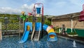 Mini waterpark with water tub on the top side. Royalty Free Stock Photo
