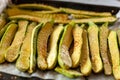 Mini zucchini roasted with parmesan cheese, closeup