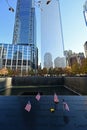 Miniature American flags and flowers at World Trade Center Memorial in New York. Royalty Free Stock Photo