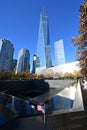 Miniature American flags and flowers at World Trade Center Memorial in New York. Royalty Free Stock Photo