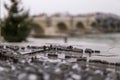 Miniature of the ancient bridge Steinbruecke in Regensburg with the real bridge blurred in the background.