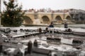 Miniature of the ancient bridge Steinbruecke in Regensburg with the real bridge blurred in the background.