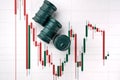 Miniature barrels and graphs of stock fluctuations. Selective focus. Close-up. The concept of rise and fall in the value of oil Royalty Free Stock Photo