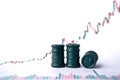 Miniature barrels and graphs of stock fluctuations. Selective focus. The concept of rise and fall in the value of oil products and Royalty Free Stock Photo