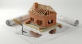Brick House Model on Blueprint with Trowel Architecture Planning Royalty Free Stock Photo