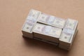 Miniature Bundles of Cash: Financial Security and Savings Concept Royalty Free Stock Photo