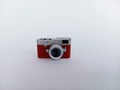 Miniature camera isolated on a white background Royalty Free Stock Photo