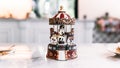 Miniature Carousel Toy over white marble top table with blur background Royalty Free Stock Photo