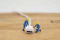 Miniature with charger plug or cable for connecting